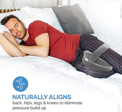 Side sleeper using a memory foam pillow between the knees