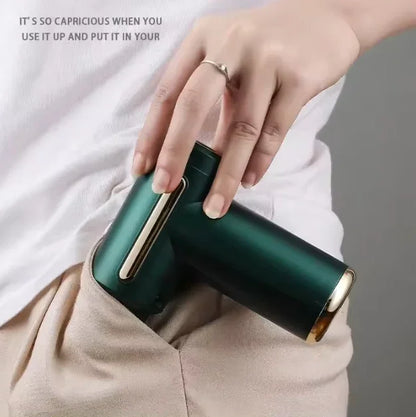 Compact rechargeable massage gun with attachments – image 2